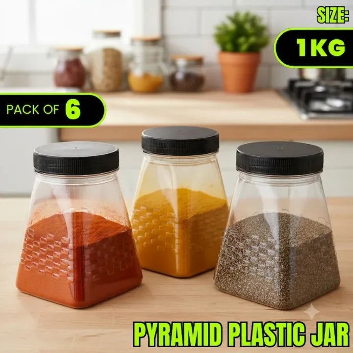 Three pyramid plastic jars with black lids on a kitchen counter, containing different spices.